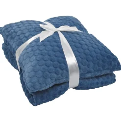 Coussin + plaid motif embossé