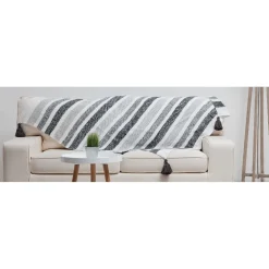 Plaid rayé à pompons