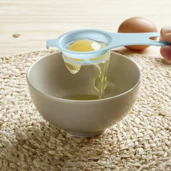 Séparateur blanc d'oeuf plastique bleu ou rose