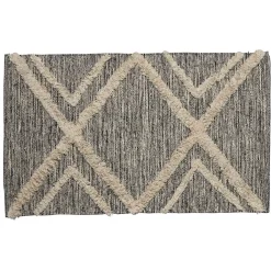 Tapis tufté noir et beige