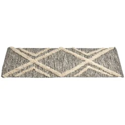 Tapis tufté noir et beige