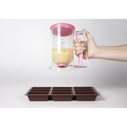 Verseur à pâte à piston