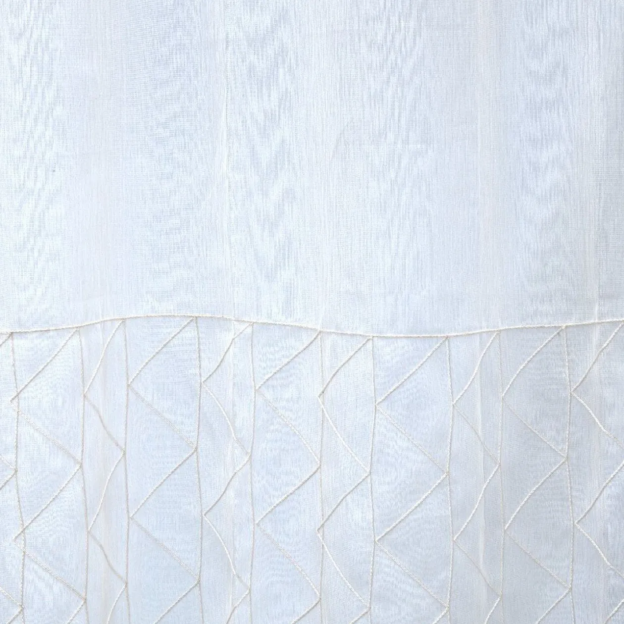 Voilage à oeillets blanc surpiqûres géométriques